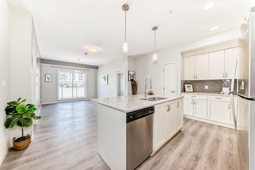 215-20 Seton Park Se, Calgary, AB - Indoor Photo Showing Kitchen With Double Sink With Upgraded Kitchen