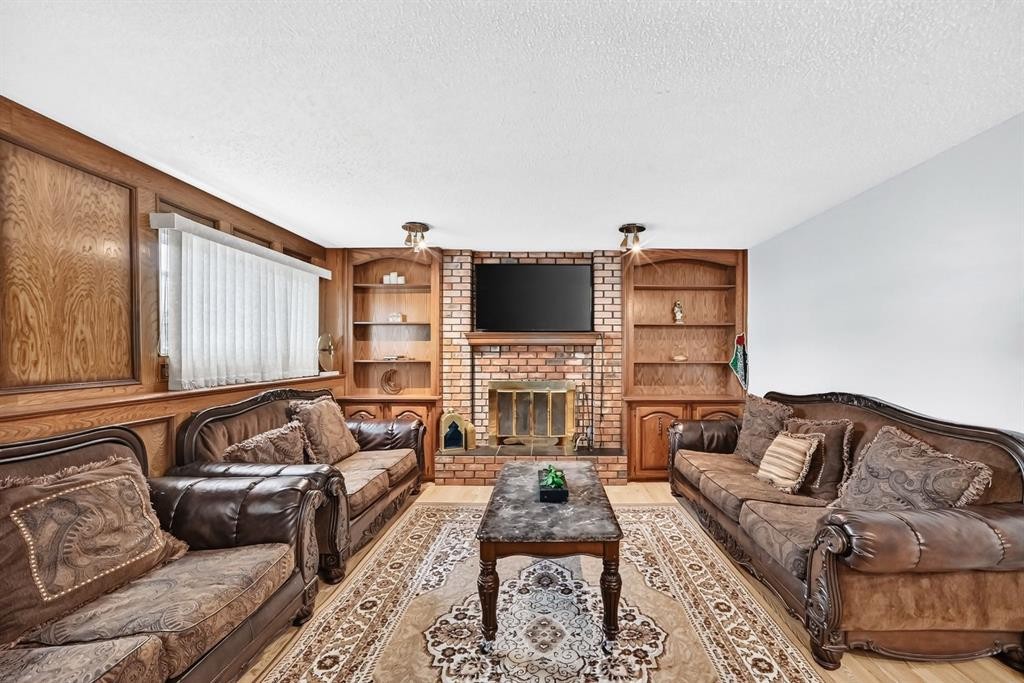 95 Templeson Way Ne, Calgary, AB - Indoor Photo Showing Living Room With Fireplace