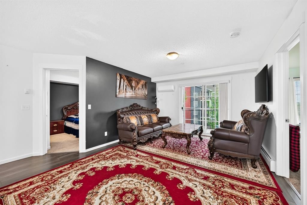 4310-755 Copperpond Boulevard Se, Calgary, AB - Indoor Photo Showing Living Room
