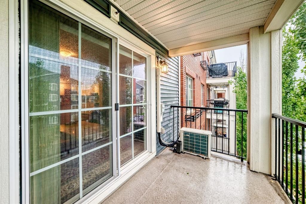 4310-755 Copperpond Boulevard Se, Calgary, AB - Outdoor With Deck Patio Veranda With Exterior