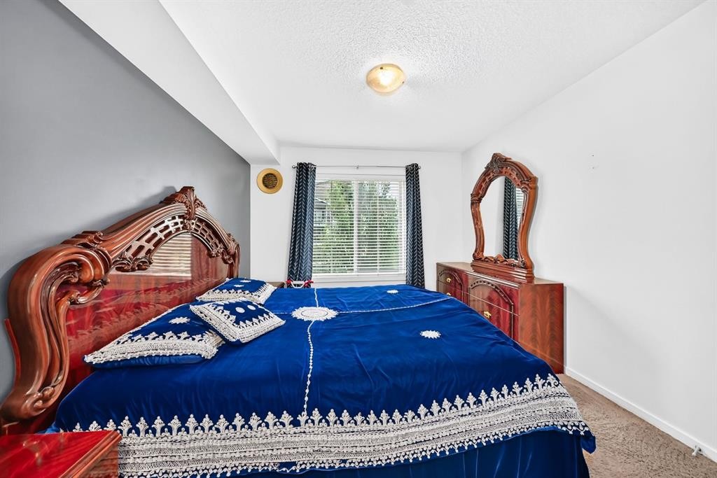 4310-755 Copperpond Boulevard Se, Calgary, AB - Indoor Photo Showing Bedroom