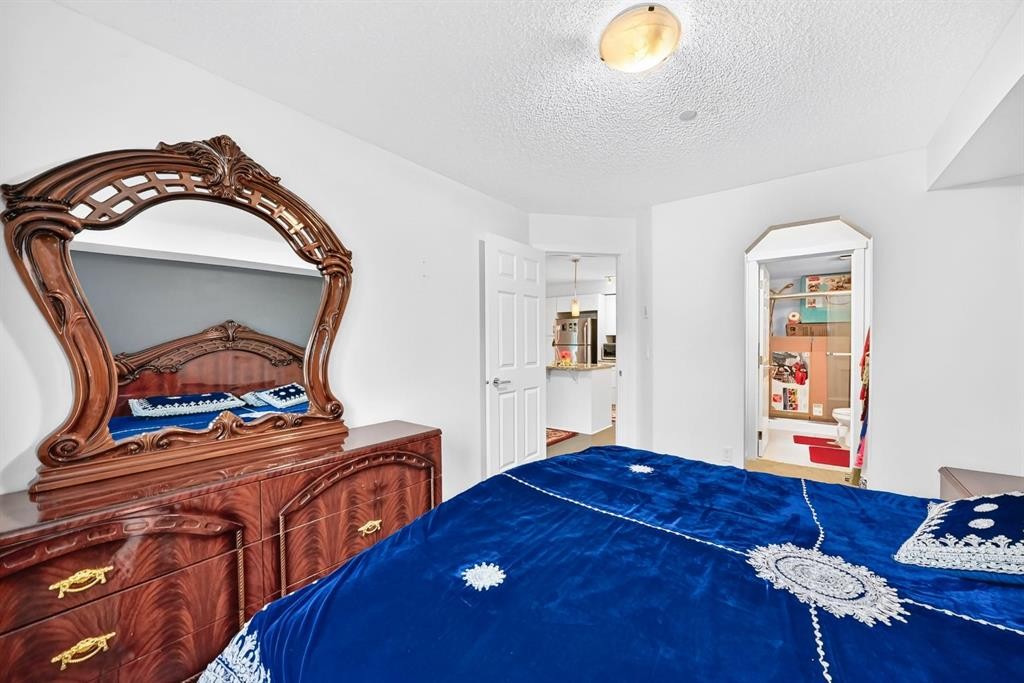4310-755 Copperpond Boulevard Se, Calgary, AB - Indoor Photo Showing Bedroom