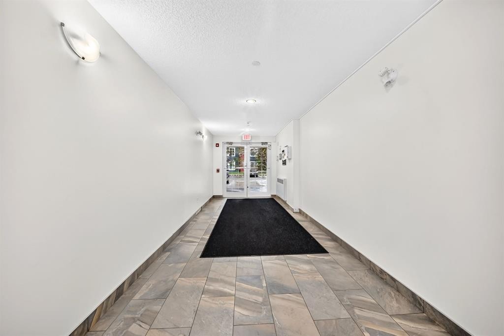 4310-755 Copperpond Boulevard Se, Calgary, AB - Indoor Photo Showing Other Room