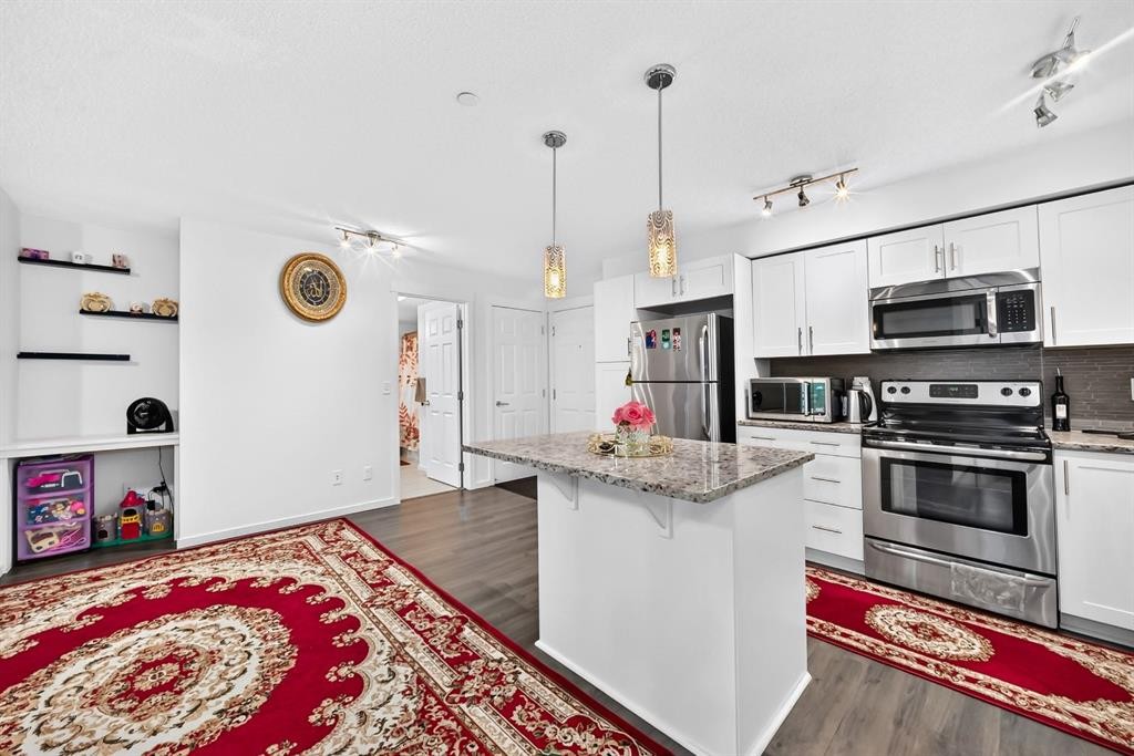 4310-755 Copperpond Boulevard Se, Calgary, AB - Indoor Photo Showing Kitchen With Upgraded Kitchen