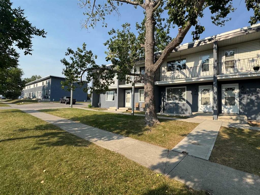 303-2211 19 Street Ne, Calgary, AB - Outdoor With Deck Patio Veranda