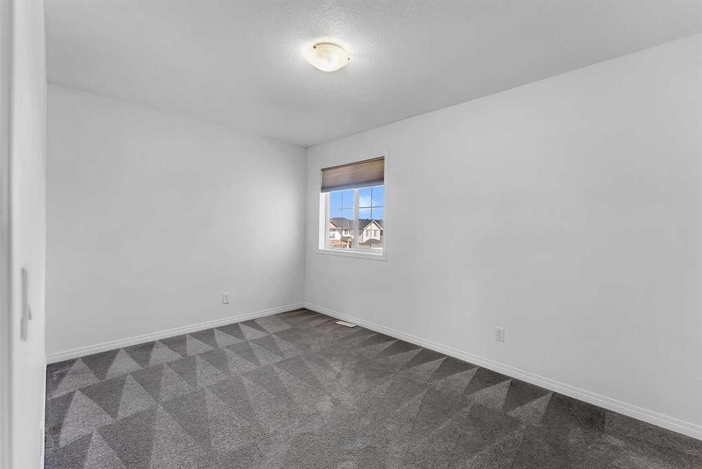 7 Saddlecrest Terrace Ne, Calgary, AB - Indoor Photo Showing Other Room