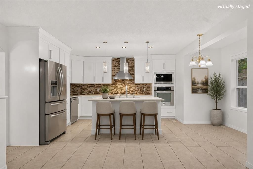 338 Panamount Drive Nw, Calgary, AB - Indoor Photo Showing Kitchen With Upgraded Kitchen