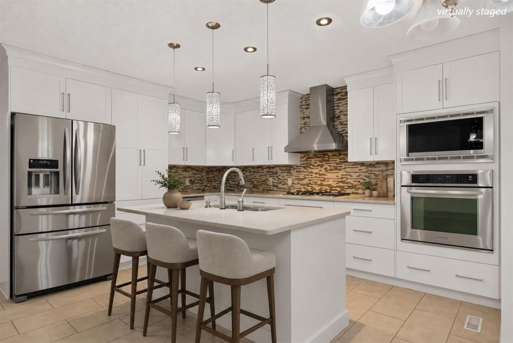 338 Panamount Drive Nw, Calgary, AB - Indoor Photo Showing Kitchen With Upgraded Kitchen