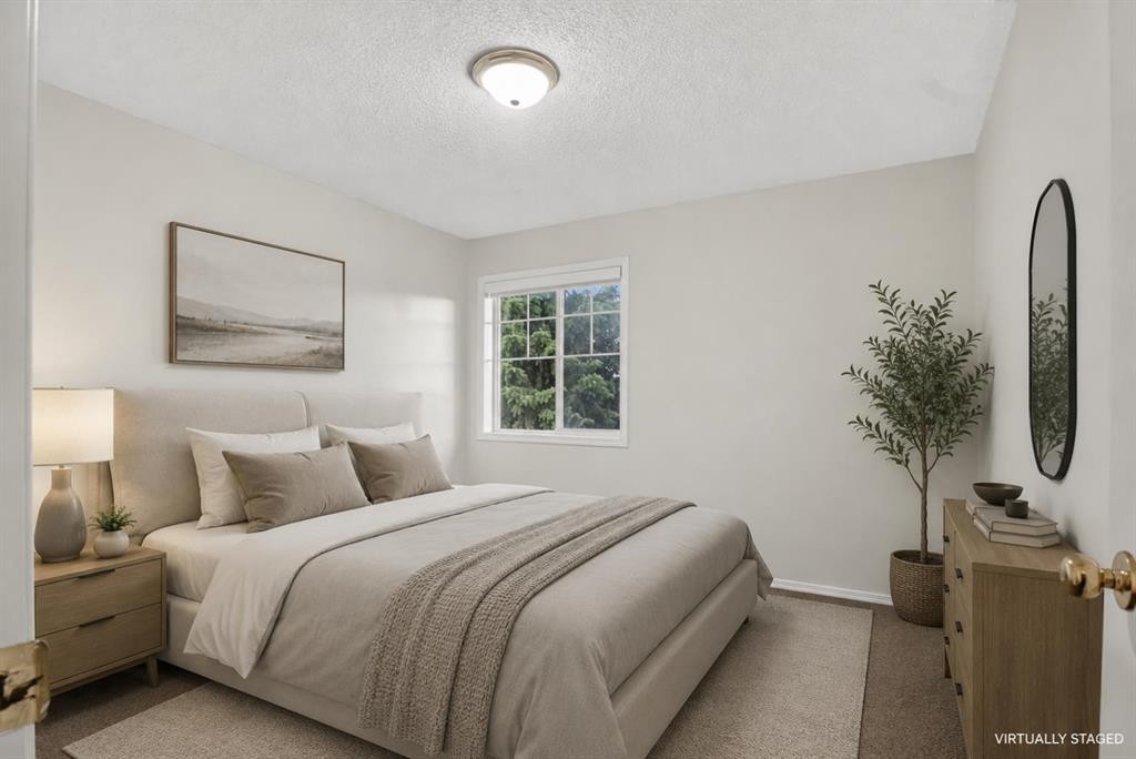338 Panamount Drive Nw, Calgary, AB - Indoor Photo Showing Bedroom