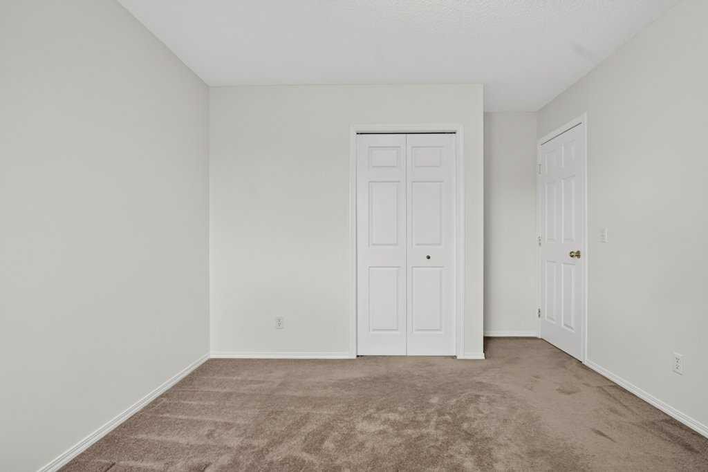 338 Panamount Drive Nw, Calgary, AB - Indoor Photo Showing Other Room