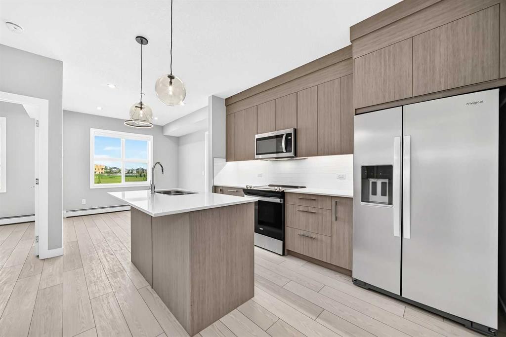 1217-63 Corner Glen Crescent Ne, Calgary, AB - Indoor Photo Showing Kitchen With Upgraded Kitchen