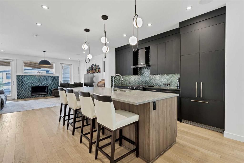 44 Timberline Way Sw, Calgary, AB - Indoor Photo Showing Kitchen With Fireplace With Upgraded Kitchen