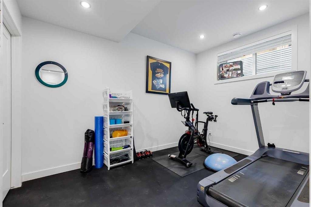 44 Timberline Way Sw, Calgary, AB - Indoor Photo Showing Gym Room