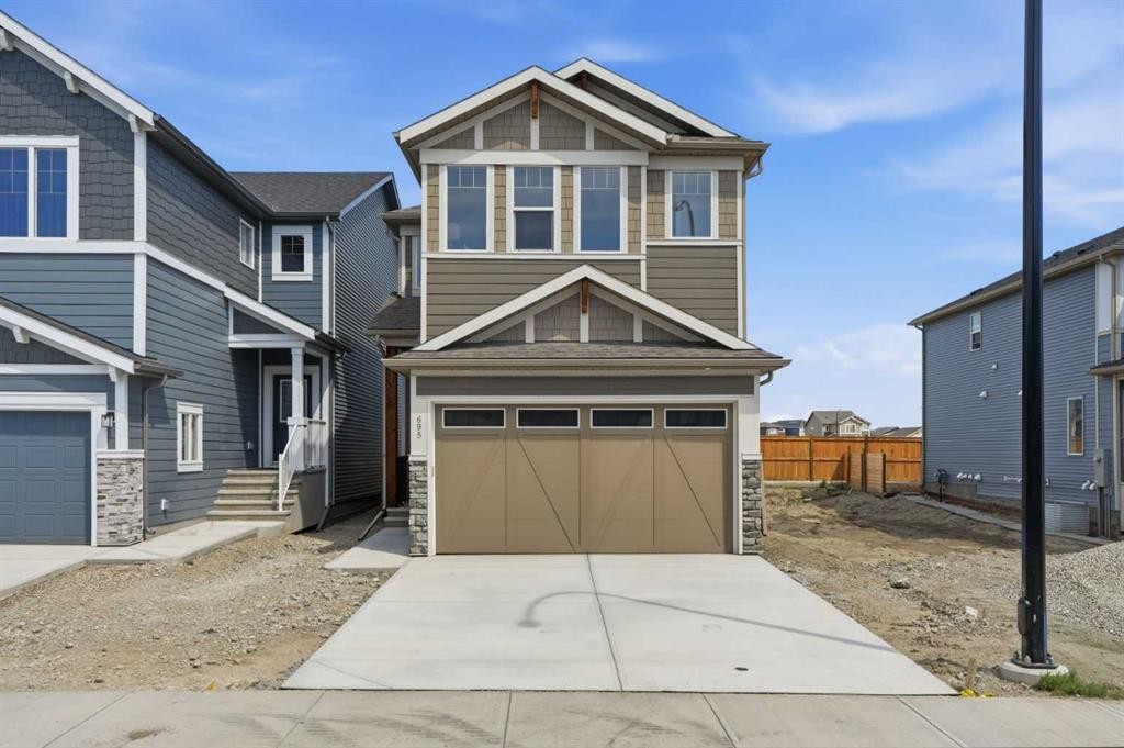 695 Buffaloberry Manor Se, Calgary, AB - Outdoor With Facade