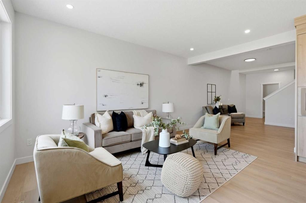 695 Buffaloberry Manor Se, Calgary, AB - Indoor Photo Showing Living Room