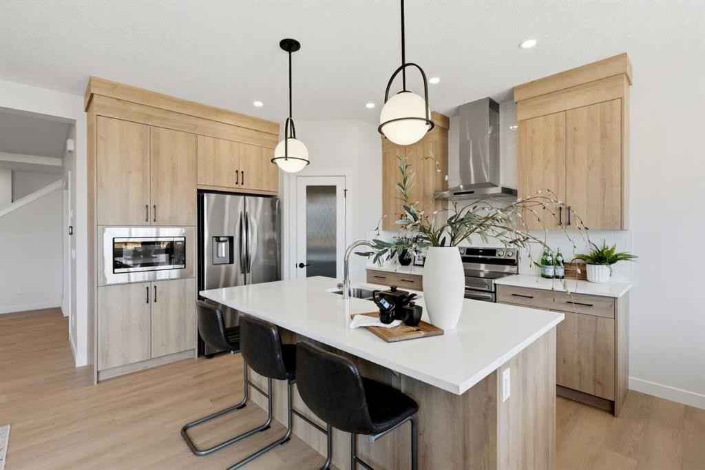 695 Buffaloberry Manor Se, Calgary, AB - Indoor Photo Showing Kitchen With Upgraded Kitchen