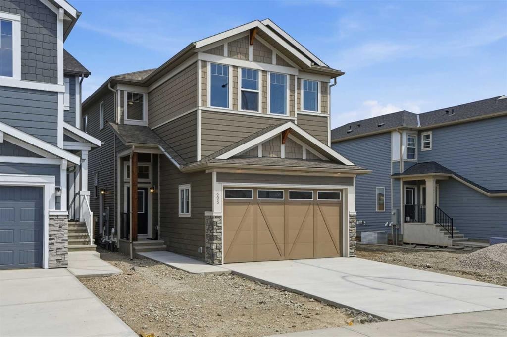 695 Buffaloberry Manor Se, Calgary, AB - Outdoor With Facade
