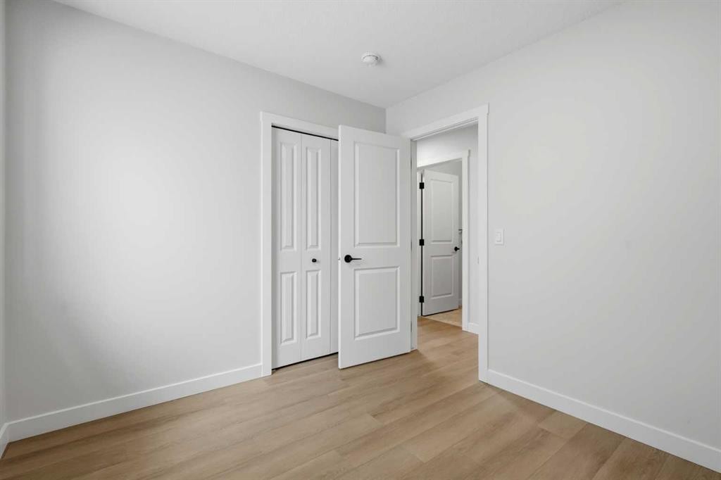 695 Buffaloberry Manor Se, Calgary, AB - Indoor Photo Showing Other Room