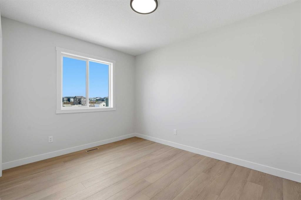 695 Buffaloberry Manor Se, Calgary, AB - Indoor Photo Showing Other Room