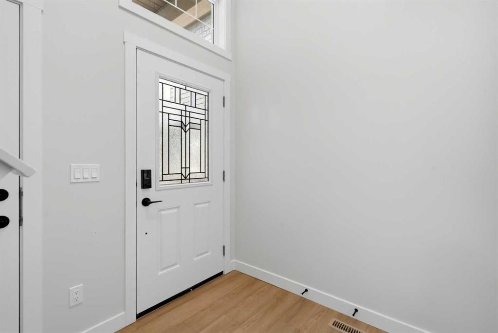 695 Buffaloberry Manor Se, Calgary, AB - Indoor Photo Showing Other Room