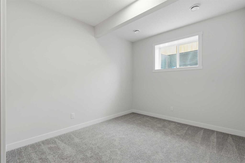 695 Buffaloberry Manor Se, Calgary, AB - Indoor Photo Showing Other Room