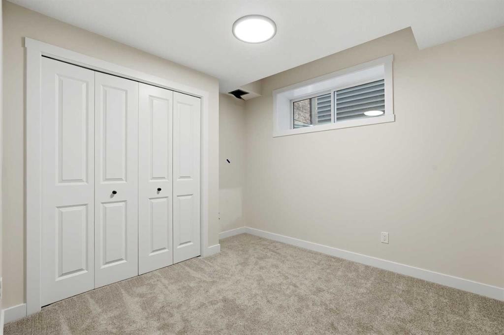 695 Buffaloberry Manor Se, Calgary, AB - Indoor Photo Showing Other Room