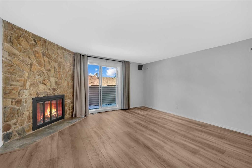 15 Ranch Glen Drive Nw, Calgary, AB - Indoor With Fireplace