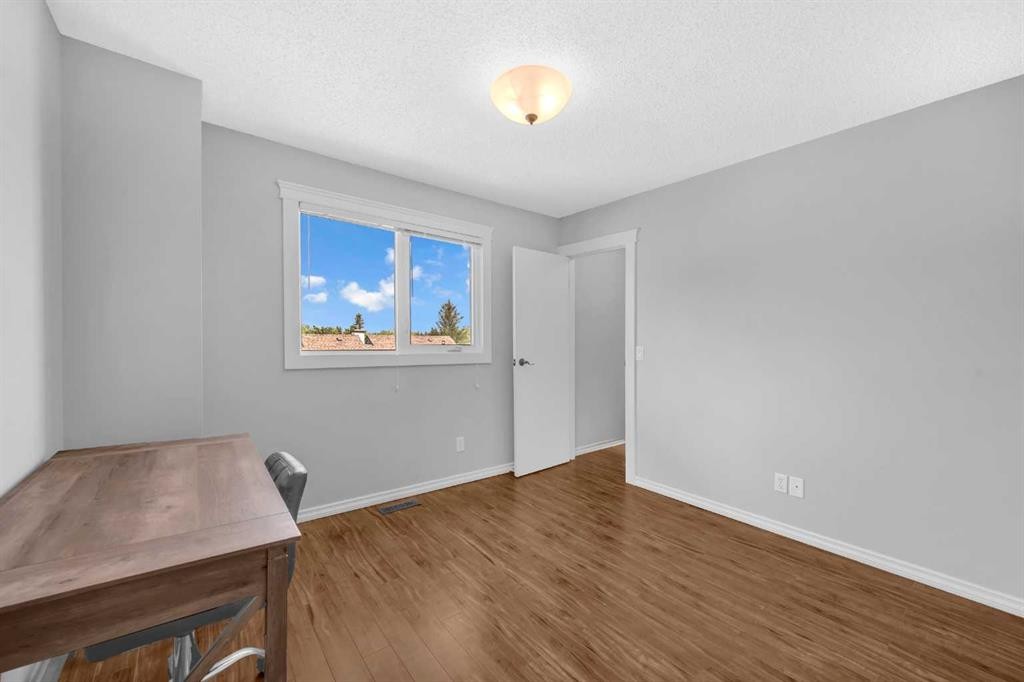 15 Ranch Glen Drive Nw, Calgary, AB - Indoor Photo Showing Other Room