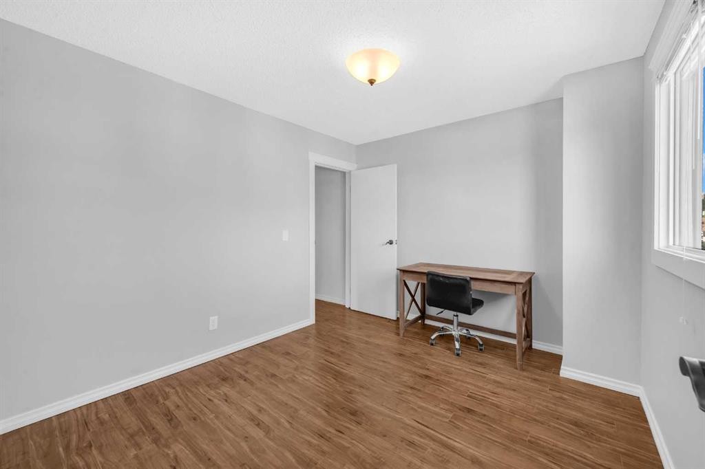 15 Ranch Glen Drive Nw, Calgary, AB - Indoor Photo Showing Other Room