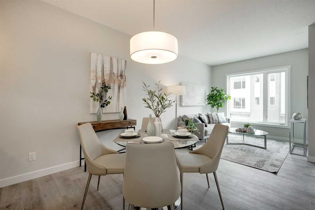 212 Shawnee Square Sw, Calgary, AB - Indoor Photo Showing Dining Room