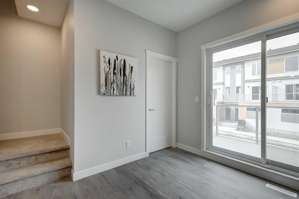 212 Shawnee Square Sw, Calgary, AB - Indoor Photo Showing Other Room