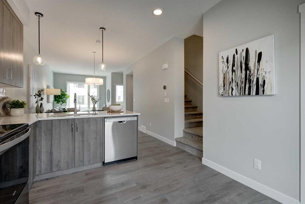 212 Shawnee Square Sw, Calgary, AB - Indoor Photo Showing Kitchen With Upgraded Kitchen