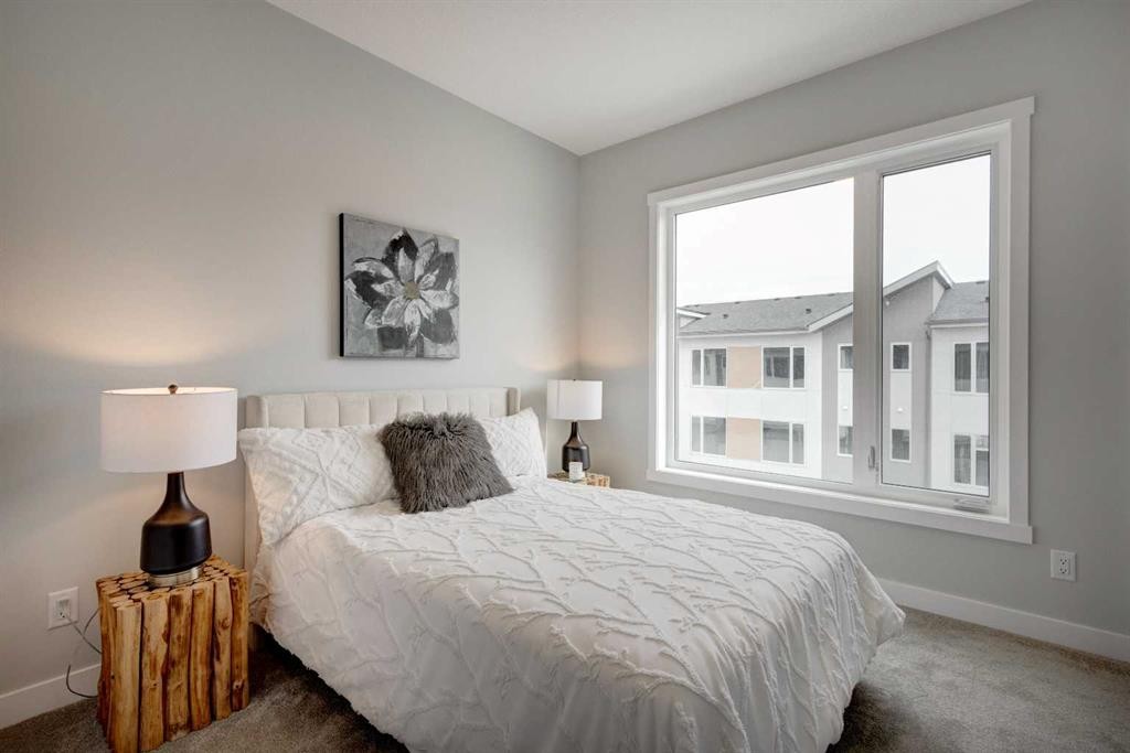 212 Shawnee Square Sw, Calgary, AB - Indoor Photo Showing Bedroom