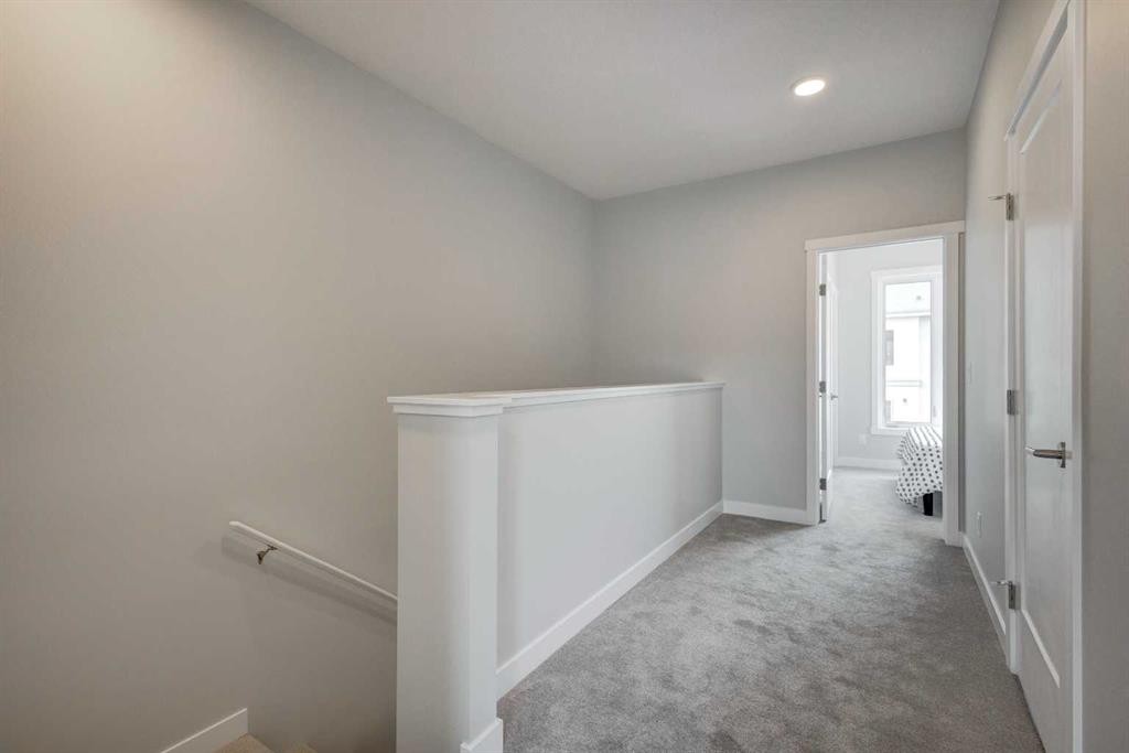 212 Shawnee Square Sw, Calgary, AB - Indoor Photo Showing Other Room
