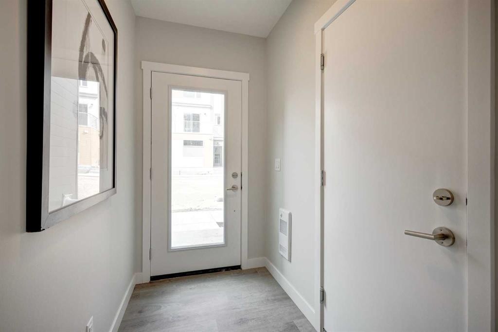 212 Shawnee Square Sw, Calgary, AB - Indoor Photo Showing Other Room