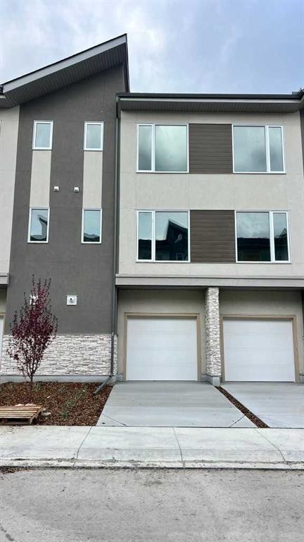 212 Shawnee Square Sw, Calgary, AB - Outdoor