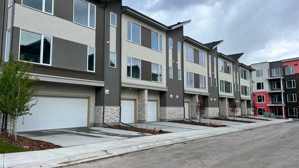 212 Shawnee Square Sw, Calgary, AB - Outdoor With Facade