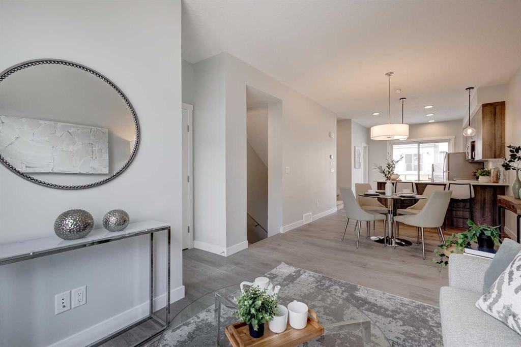 212 Shawnee Square Sw, Calgary, AB - Indoor Photo Showing Dining Room