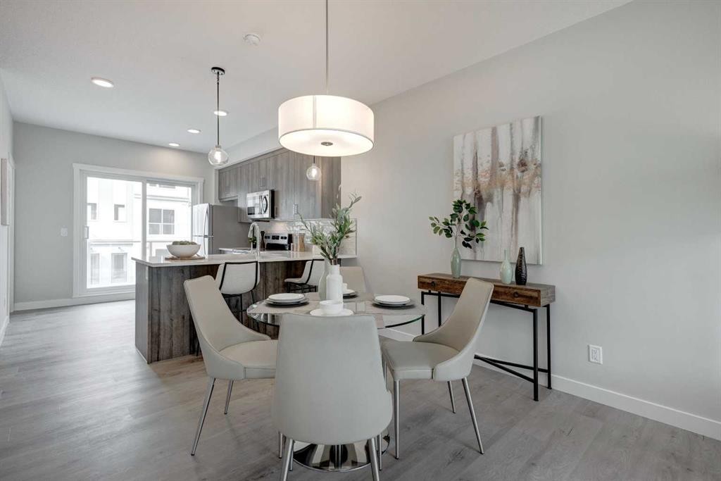 212 Shawnee Square Sw, Calgary, AB - Indoor Photo Showing Dining Room