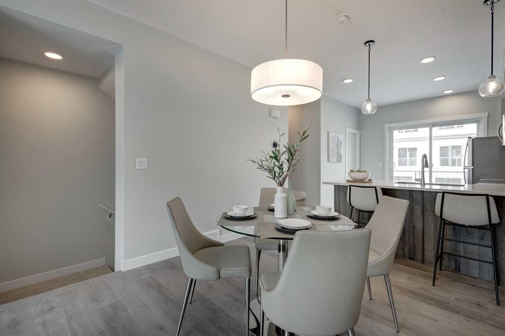212 Shawnee Square Sw, Calgary, AB - Indoor Photo Showing Dining Room