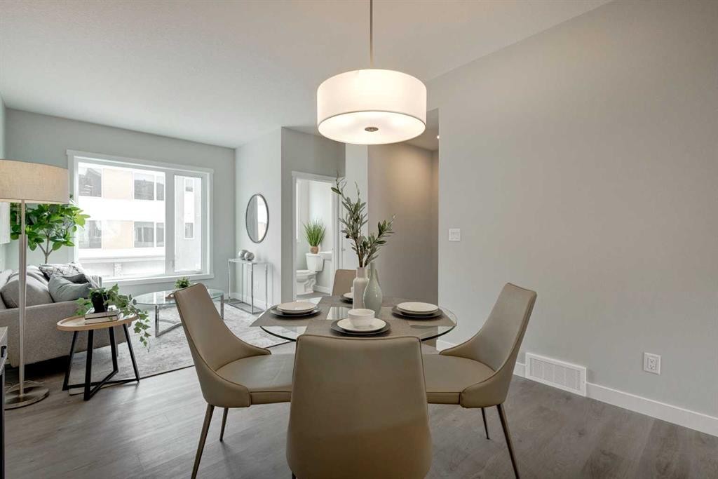212 Shawnee Square Sw, Calgary, AB - Indoor Photo Showing Dining Room