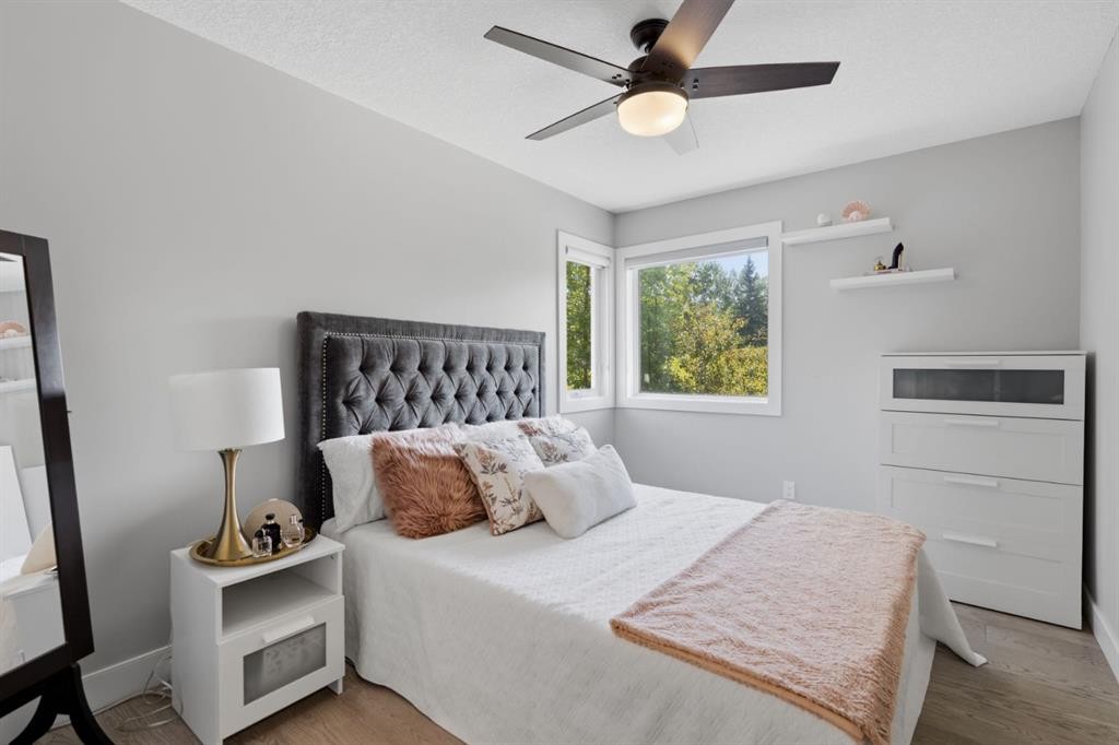 30 Strathcona Road Sw, Calgary, AB - Indoor Photo Showing Bedroom