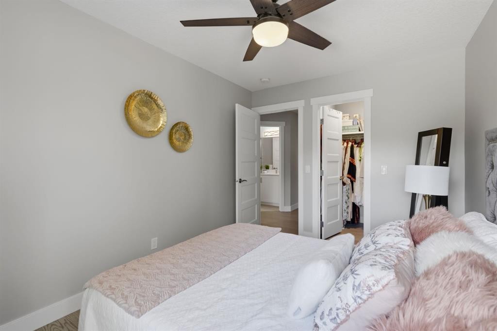 30 Strathcona Road Sw, Calgary, AB - Indoor Photo Showing Bedroom