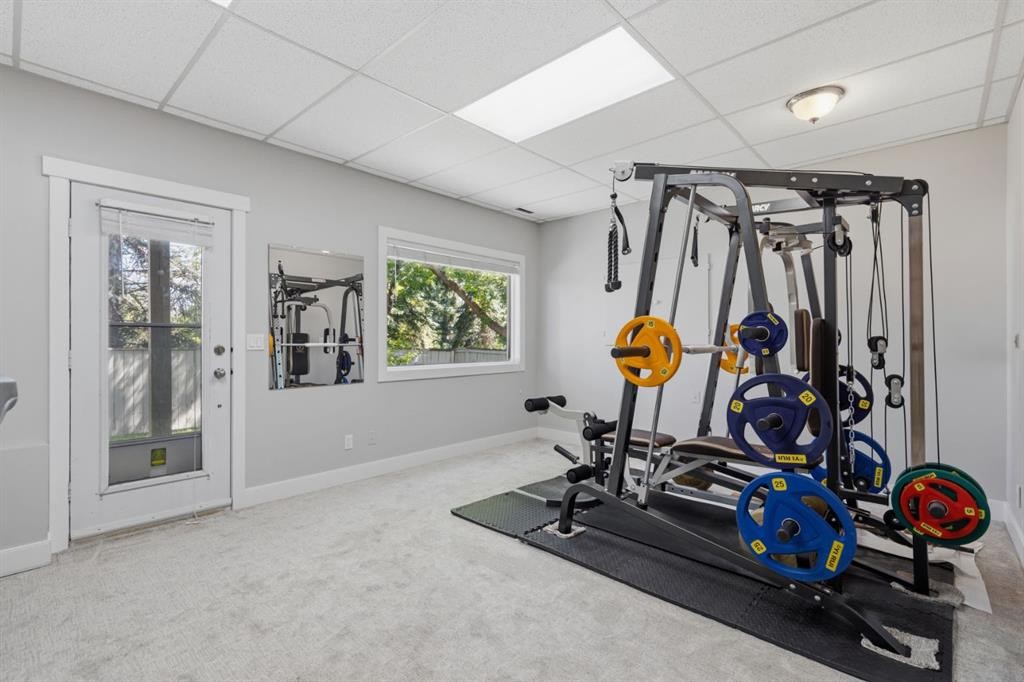 30 Strathcona Road Sw, Calgary, AB - Indoor Photo Showing Gym Room