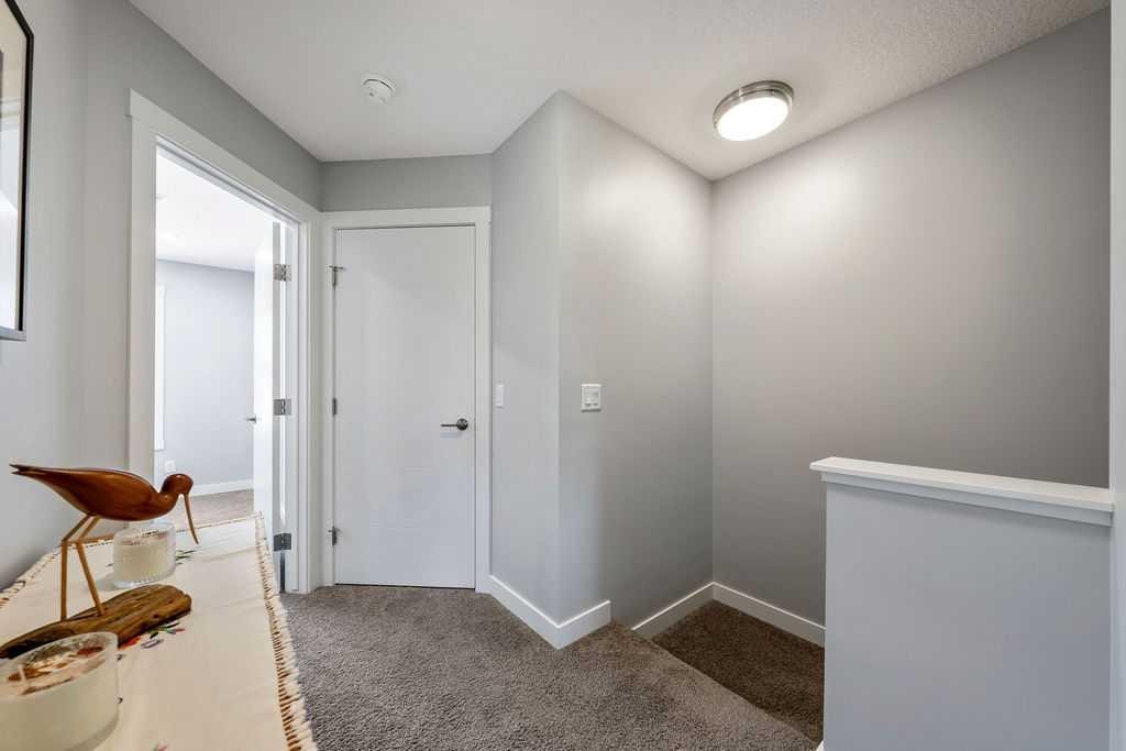 869 Cranston Avenue Se, Calgary, AB - Indoor Photo Showing Other Room