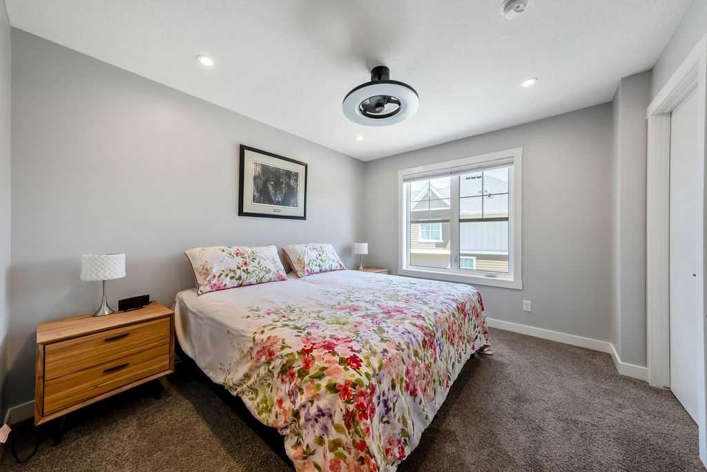 869 Cranston Avenue Se, Calgary, AB - Indoor Photo Showing Bedroom
