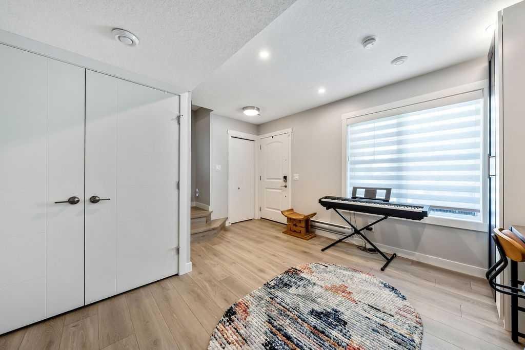 869 Cranston Avenue Se, Calgary, AB - Indoor Photo Showing Other Room