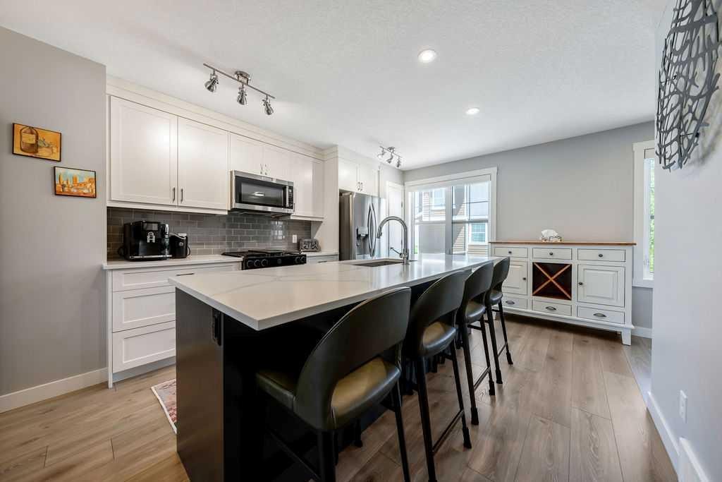 869 Cranston Avenue Se, Calgary, AB - Indoor Photo Showing Kitchen With Upgraded Kitchen