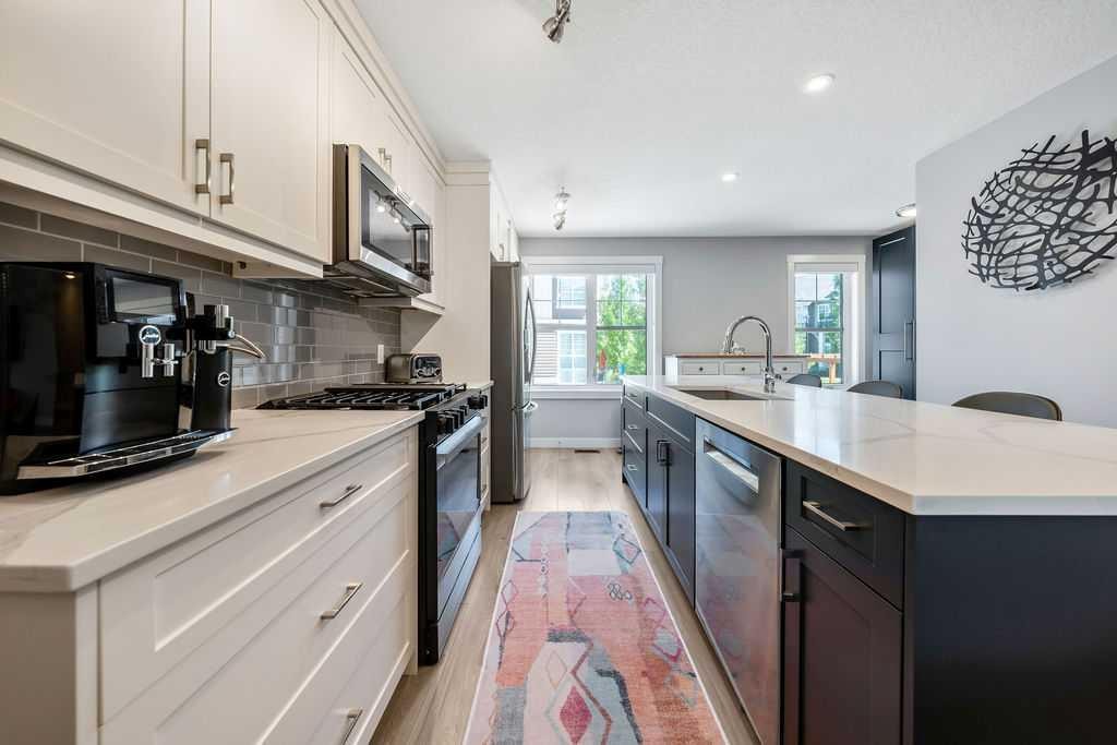 869 Cranston Avenue Se, Calgary, AB - Indoor Photo Showing Kitchen With Upgraded Kitchen