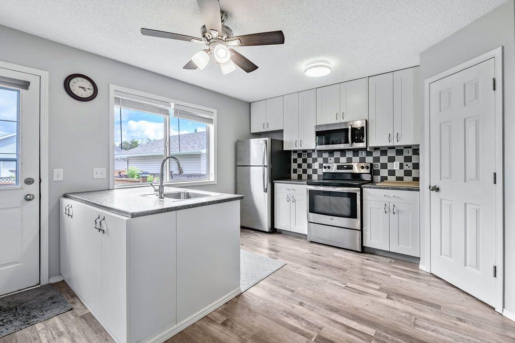 24 Cimarron Meadows Road, Okotoks, AB